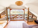 Galerie: Panoramazimmer mit herrlicher Aussicht auf den Millstätter See – Seevilla Leitner – Ferienhaus direkt am Millstätter See in Kärnten
